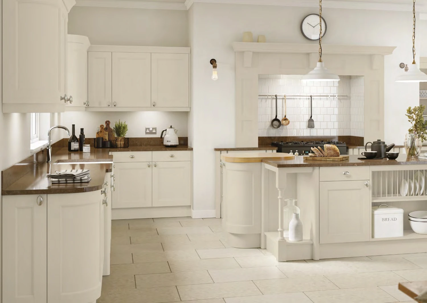 Bright Windsor Taupe Grey fitted kitchen interior with classic cabinetry and a kitchen island